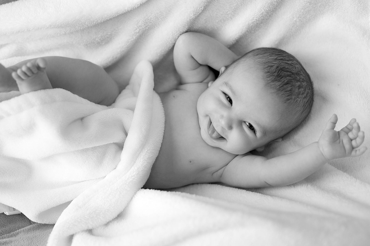 Op maat gemaakte babydeken met naam geborduurd. Op maat gemaakte babydeken met naam geborduurd.